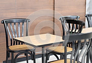 Modern tables and chairs in coffee shop or bekery store