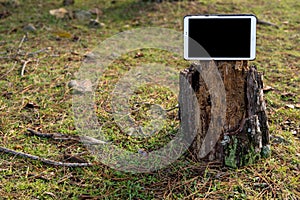 Modern tablet device outdoors in rural setting