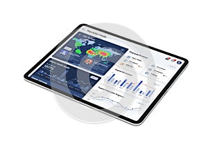 Modern tablet displaying business analytics and data visualization dashboards with graphs and world map