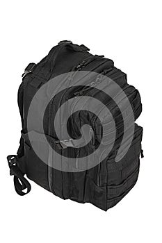 Modern tactical backpack with zippers and additional pockets. Large secure bag. Isolate on a white back
