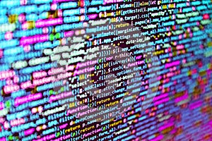Modern tech. Data encryption security code on a computer display. Php code on blue background in code editor. Web developer