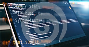 Modern tech. PHP syntax highlighted. Writing programming functions on laptop. Big data and Internet of things trend