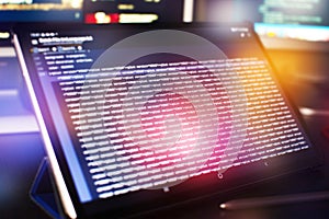Modern tech. PHP syntax highlighted. Writing programming functions on laptop. Big data and Internet of things trend