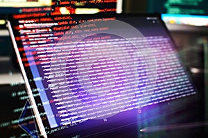 Modern tech. PHP syntax highlighted. Writing programming functions on laptop. Big data and Internet of things trend