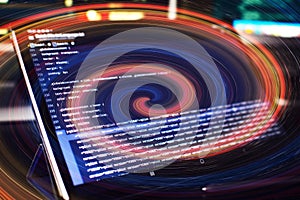 Modern tech. PHP syntax highlighted. Writing programming functions on laptop. Big data and Internet of things trend