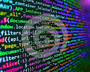 Modern technologies, web cascading design. Software developer programming code on computer monitor. Programming code abstract