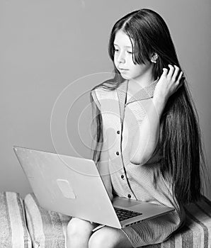 Modern technology. Education nowadays demand modern gadgets. Schoolgirl surfing internet. Do homework or play games