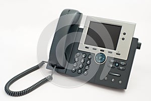 Modern telephone on white