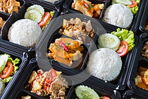 Modern Thai food lunch boxes in plastic packages