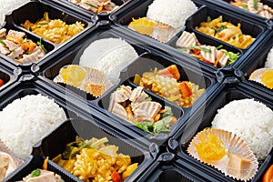 Modern Thai food lunch boxes in plastic packages