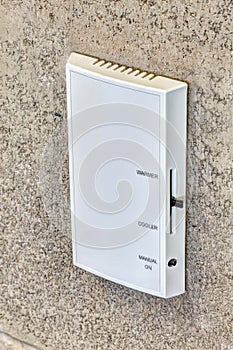 A modern thermostat for controlling individual room temperatures.