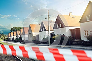 Modern tipical white houses in Dresden, Germany with warning tape