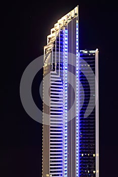 Australian modern tower building in blue at night