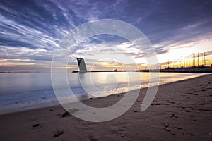Modern tower at the sunset