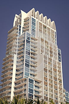 Modern towerblock high-rise building architecture on blue sky in South Beach, USA photo