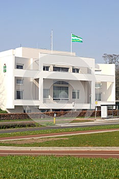 Modern town-hall with municipality flag in Soest,Netherlands