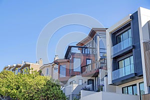 Modern and traditional townhouses in a sloped suburbs of San Francisco, CA