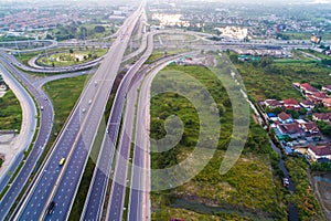 Modern traffic road way to city in morning light