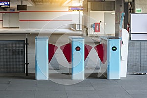 Modern train station entrance open gates entrance and exit with electronic card readers