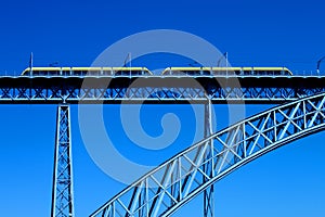 Modern tram on a steel bridge