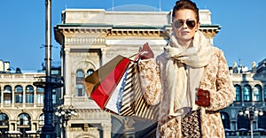 Modern traveller woman in Milan, Italy standing