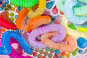 Pop-it, simple-dimple, squishy, pop-tubes background photo