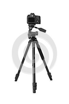 Modern tripod with camera isolated on white