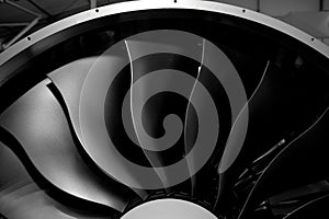 Modern turbofan engine. close up of turbojet of aircraft on black background