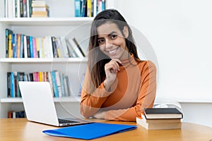 Modern turkish female student at computer