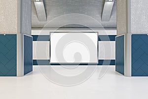 Modern underground interior with empty white mock up billboard commercial frame and tile walls. Subway, metro and urban under