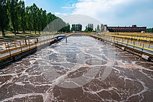 Modern urban wastewater and sewage treatment plant with aeration tanks, industrial water recycling and purification