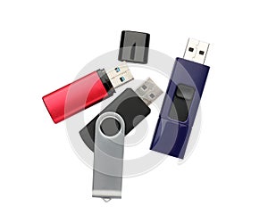 Modern usb flash drives on white background, top view