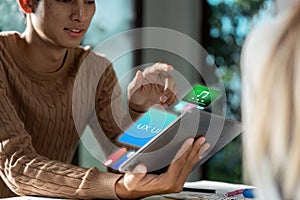 Modern UX UI Design with Interactive Digital Interface on Tablet in Creative Workspace