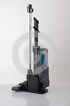 Modern vacuum cleaner in keeping stand isolated