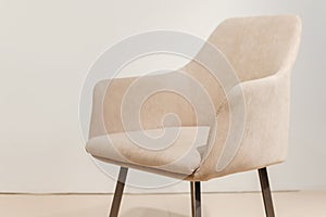 Modern velours armchair in a room