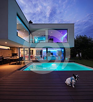 Modern villa with colored led lights at night