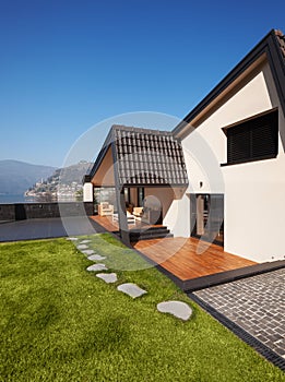 Modern villa, exterior with lawn, nobody