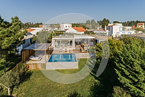 Modern villa with pool and deck with interior