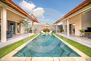 Modern villa with pool, view from the garden