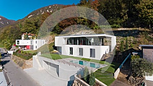 Modern villa with swimming pool, aerial view