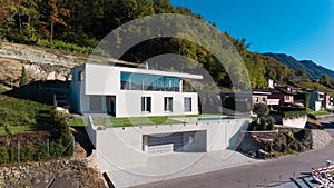 Modern villa with swimming pool, aerial view