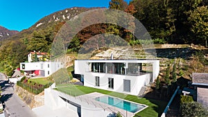 Modern villa with swimming pool, aerial view