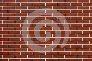 Modern wall is made of red, decorative ceramic clinker brick. Ba