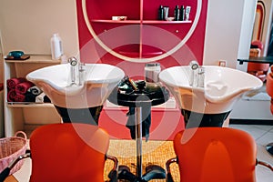 Modern wash basins in hairdressing salon, nobody