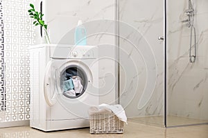 Modern washing machine with towels