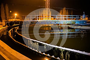 Modern wastewater treatment plant of chemical factory at night.