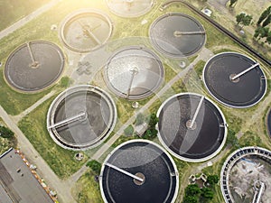 Modern wastewater treatment plant with round ponds for recycle dirty sewage water, aerial view