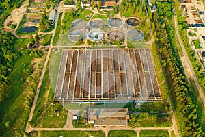 Modern Wastewater Treatment Plant with sedimentation tanks and pools with sludge filtration of sewer water, aerial view