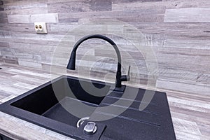 Modern water tap sink with faucet. New home. Interior detail