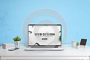 Modern website of web design company presented on a laptop computer